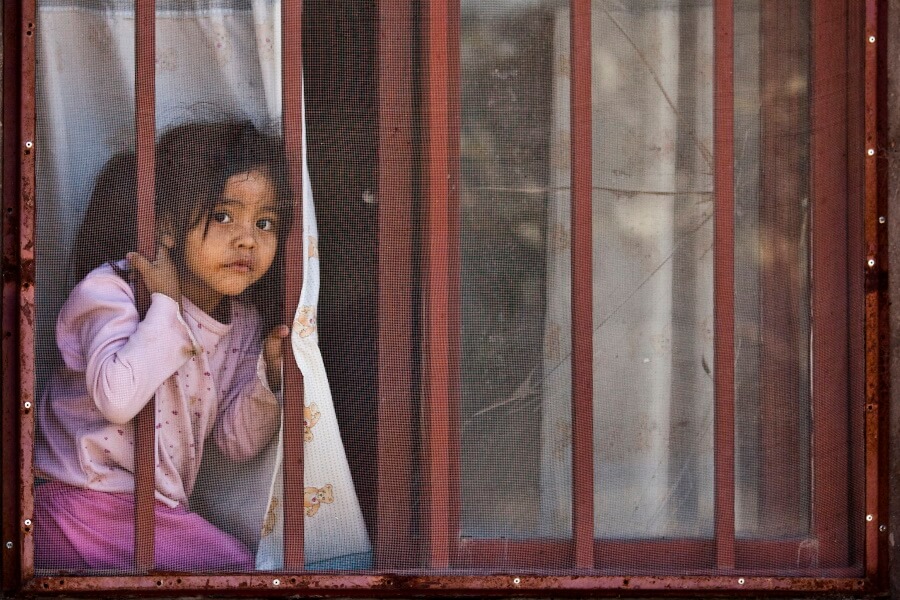 Girl Looking Out Of The Window Documentary Photography