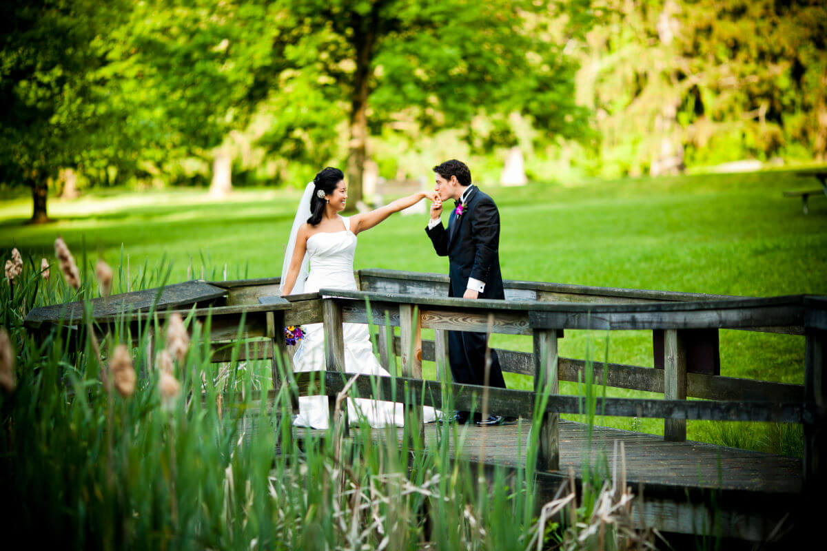 Elegant Wedding Couple Taking A Stroll Through The Park In Philadelphia