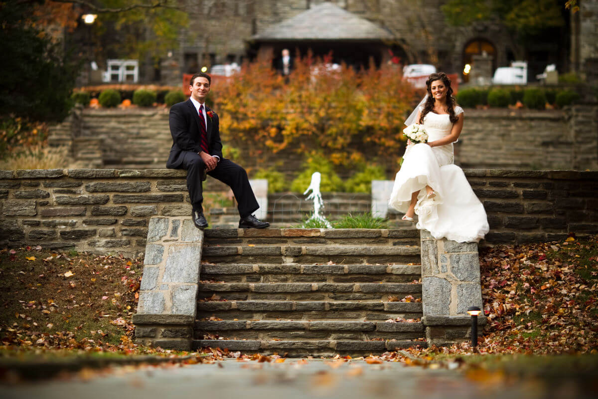 Groom And A Bride Sitting On A Stairway In Pennsylvania