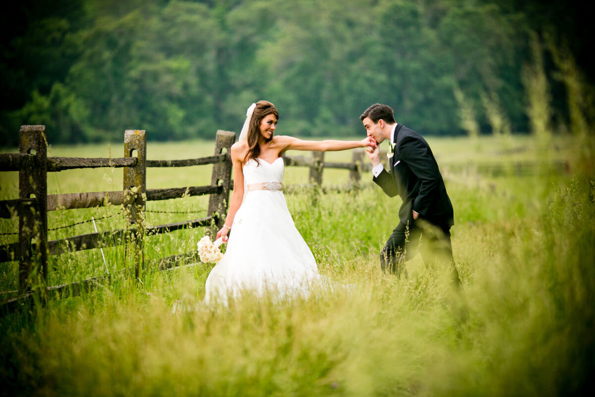 Groom And Bride Happily Exploring Countryside In Pennsylvania