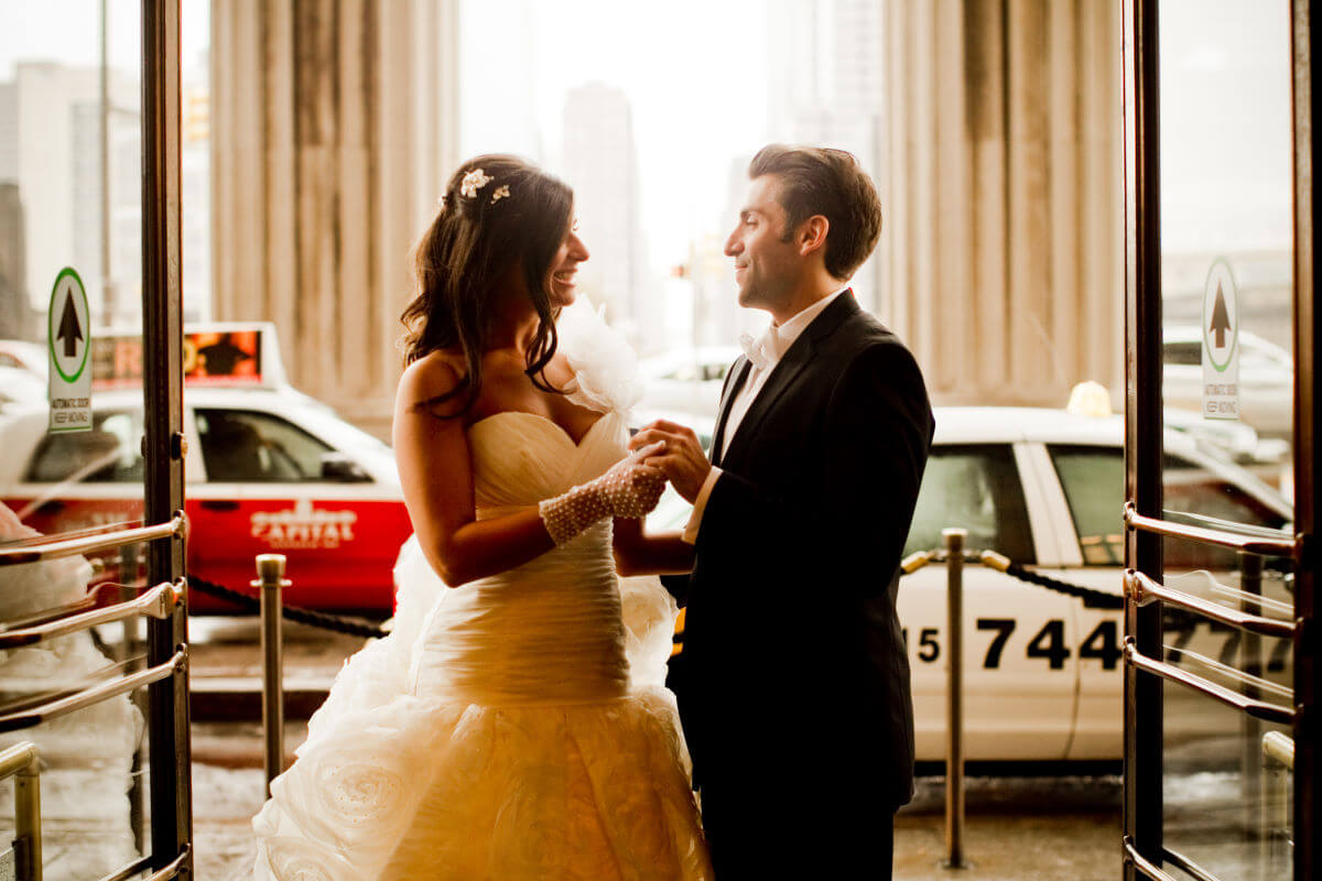 Photo Of A Wedding Couple With Busy Streets Of Philadelphia In The Background