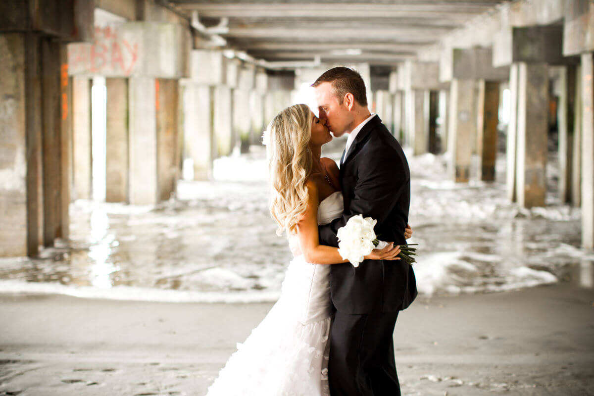 Wedding Couple Kissing In The Modern Building