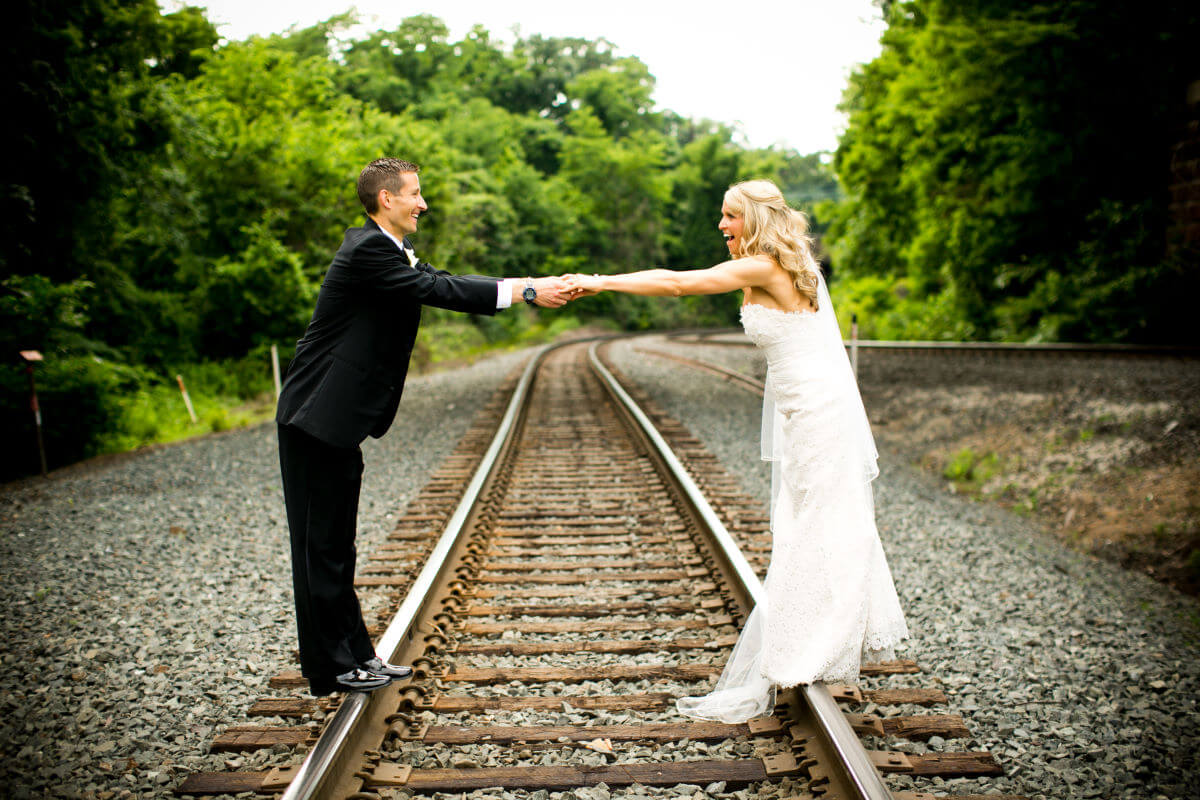 Wedding Couple Posing Next To The Railway In Pennsylvania