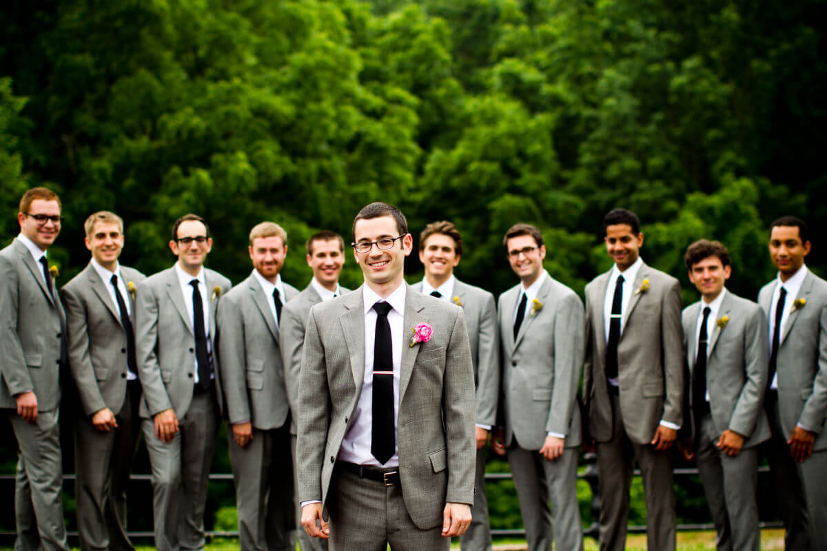 Wedding Photography Of A Groom Posing With His Friends